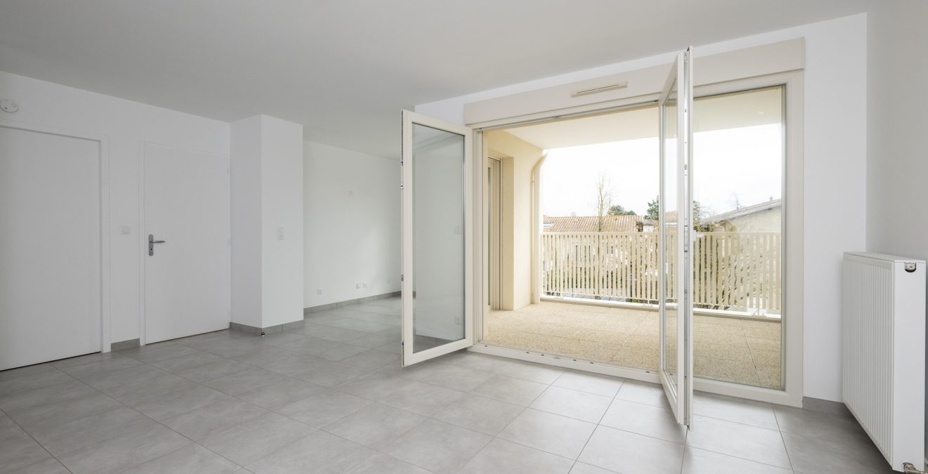 pièce de vie terrasse logement neuf St Bernard